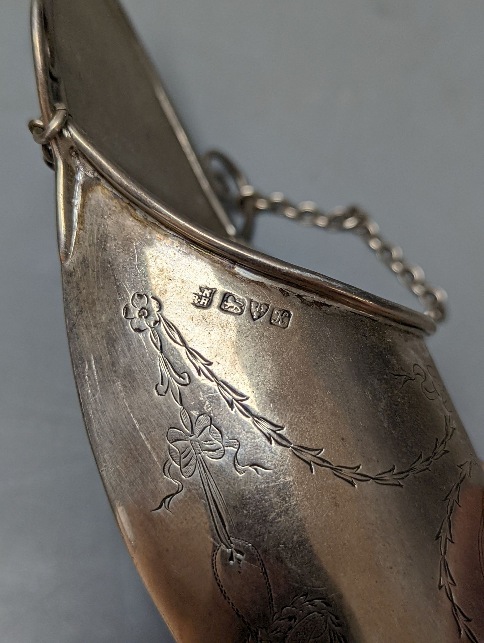 A George V engraved silver 'slipper' wall pocket, Chester, 1910, 19.6cm, 90 grams.